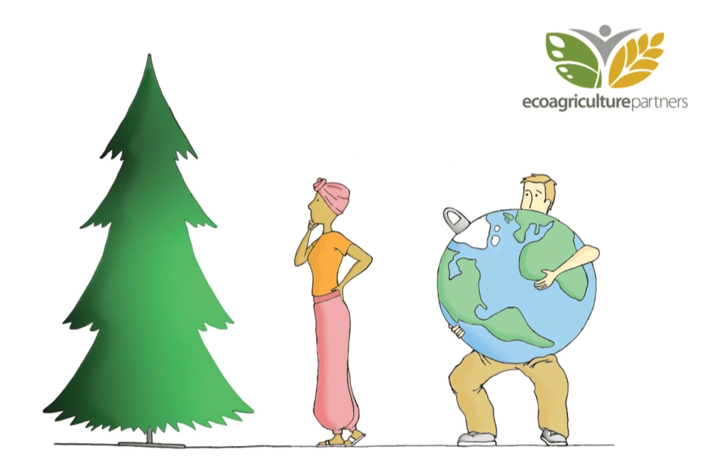 Decorating a tree with an earth bauble