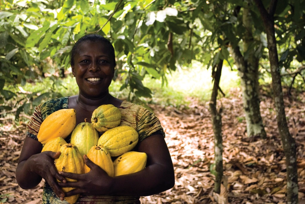 A woman holding indigenous fruit A woman holding indigenous fruit