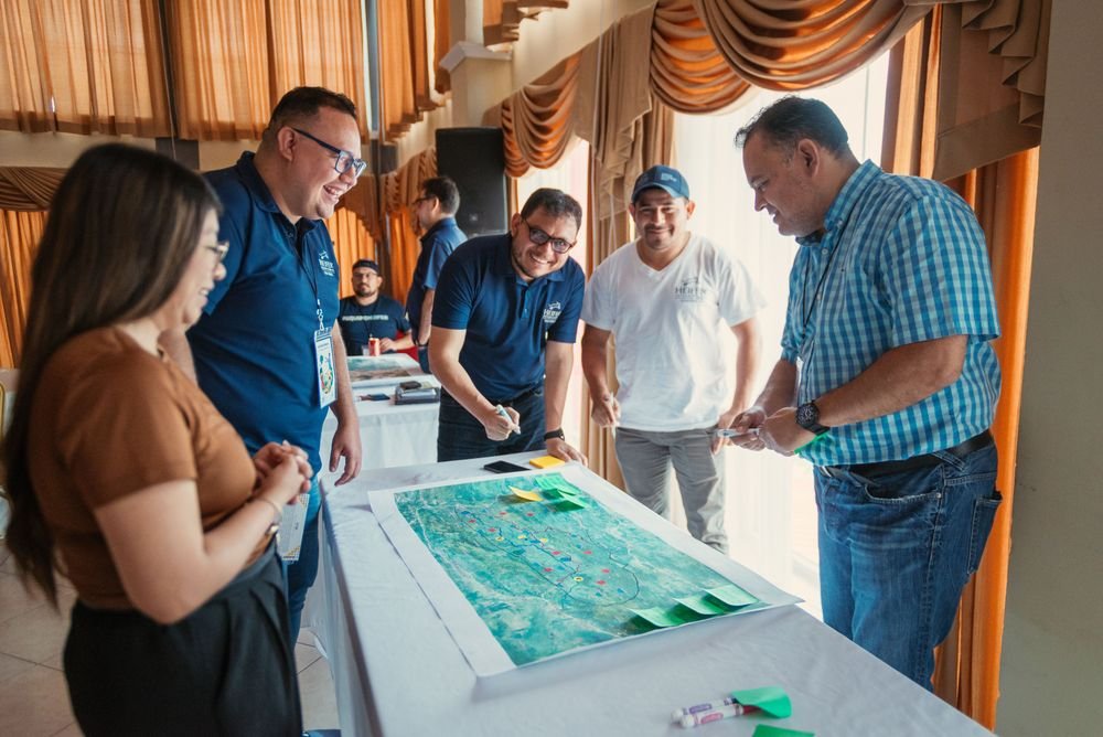 Workshop participants work on a landscape map