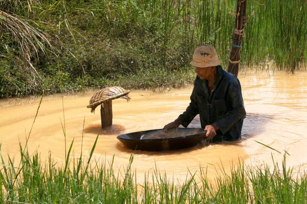 man mining in river man mining in river